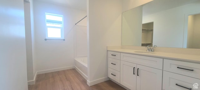 3578 W 4835 S Lot 13, Roy, UT 84067 - bathroom with vanity, wood finished floors, bathing tub / shower combination, and baseboards