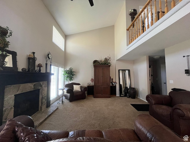 4863 Glasmann Way, Ogden, UT 84403 - carpeted living room with a towering ceiling, a ceiling fan, a fireplace, and baseboards