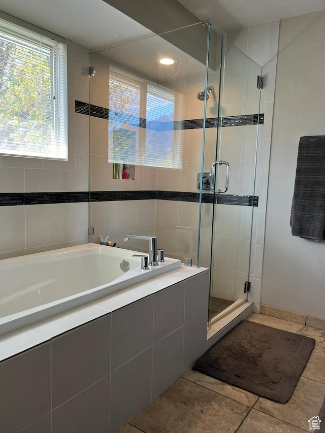 4863 Glasmann Way, Ogden, UT 84403 - full bath with tile patterned flooring, a shower stall, a bath, and tile walls