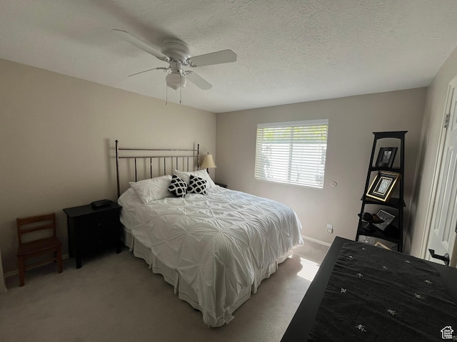 4863 Glasmann Way, Ogden, UT 84403 - bedroom featuring light colored carpet, ceiling fan, baseboards, and a textured ceiling