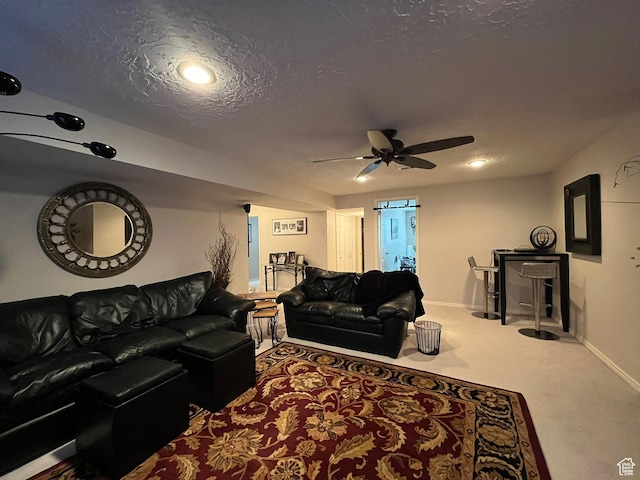 4863 Glasmann Way, Ogden, UT 84403 - living area with ceiling fan, baseboards, carpet flooring, and a textured ceiling