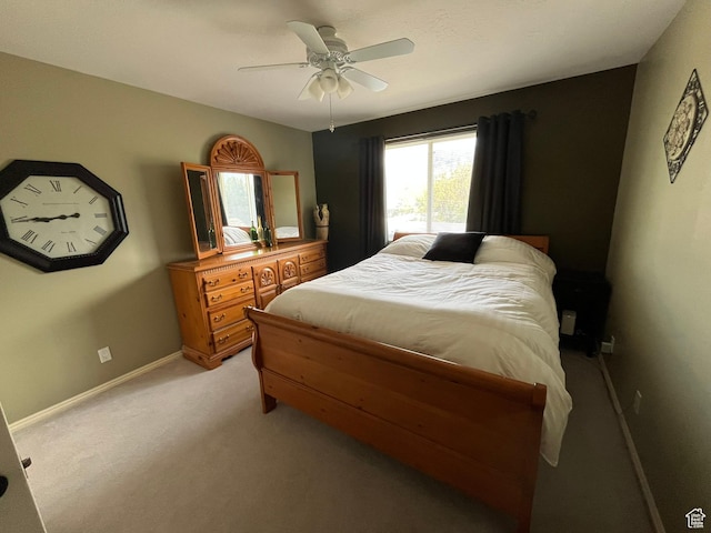 4863 Glasmann Way, Ogden, UT 84403 - bedroom with light colored carpet, baseboards, and ceiling fan