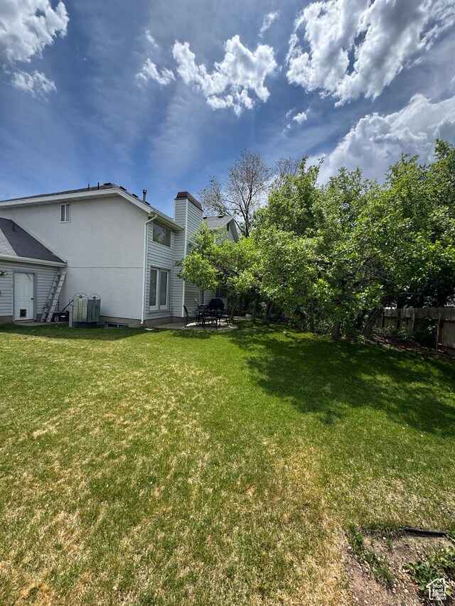 4863 Glasmann Way, Ogden, UT 84403 - view of yard featuring a patio