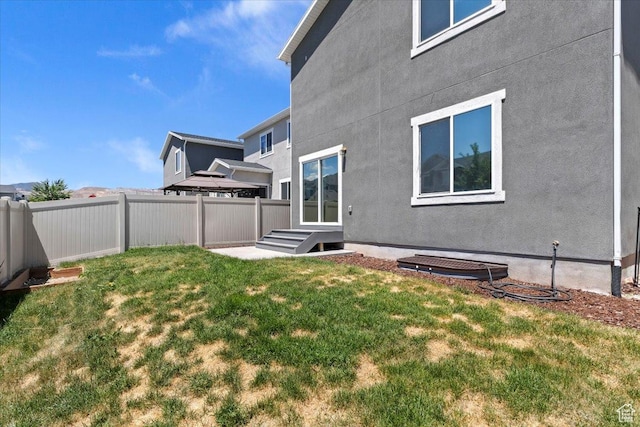 5621 W Stillwell Ln S, Herriman, UT 84096 - back of property with stucco siding