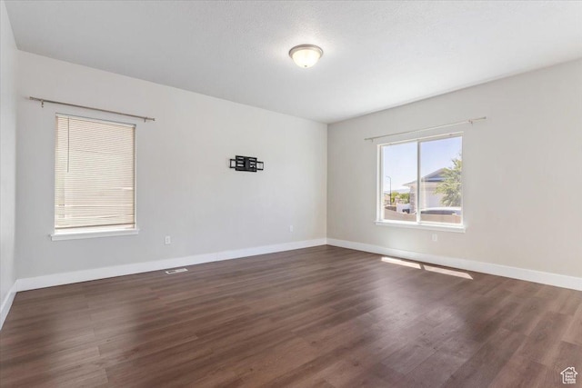 5621 W Stillwell Ln S, Herriman, UT 84096 - empty room with wood finished floors and baseboards