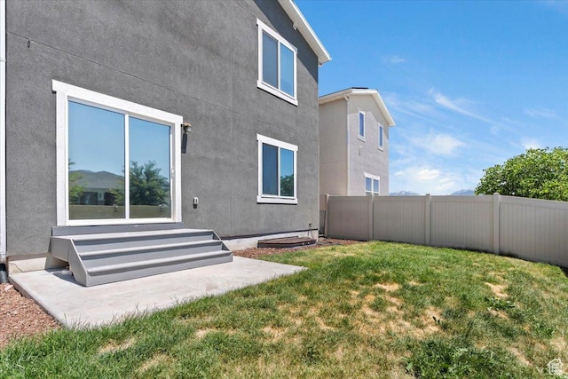 5621 W Stillwell Ln S, Herriman, UT 84096 - rear view of property with entry steps and stucco siding