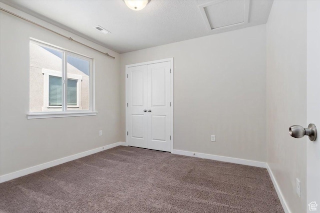 5621 W Stillwell Ln S, Herriman, UT 84096 - unfurnished bedroom featuring carpet floors, baseboards, and a closet