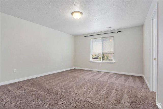 5621 W Stillwell Ln S, Herriman, UT 84096 - spare room with a textured ceiling, carpet flooring, and baseboards