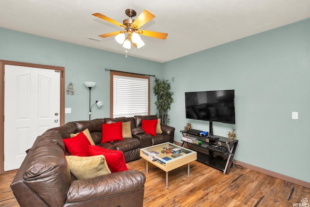 855 W 350 N, Tremonton, UT 84337 - living room featuring wood finished floors, ceiling fan, and baseboards