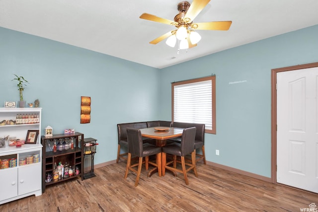 855 W 350 N, Tremonton, UT 84337 - dining area featuring wood finished floors, ceiling fan, and baseboards