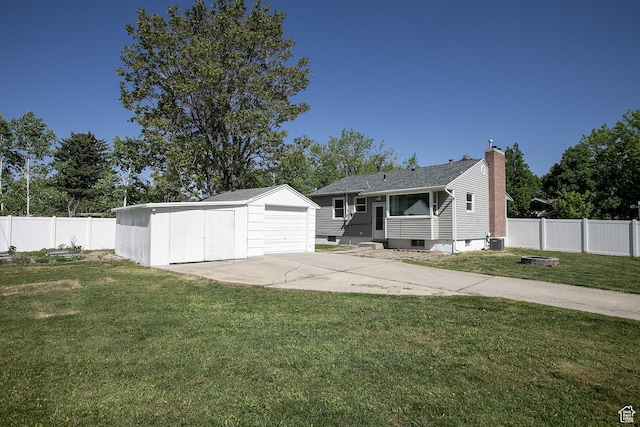 604 E 3635 S, Salt Lake City, UT 84106 - view of front of property featuring an outdoor structure, cooling unit, a chimney, a garage, and entry steps