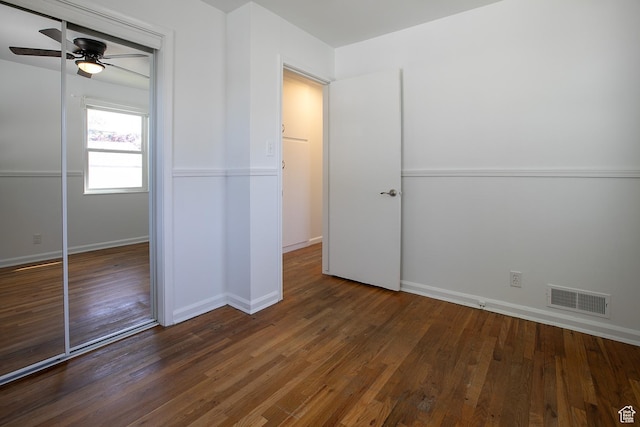 604 E 3635 S, Salt Lake City, UT 84106 - unfurnished bedroom with a closet, wood finished floors, baseboards, and a ceiling fan