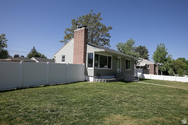 604 E 3635 S, Salt Lake City, UT 84106 - view of front facade featuring a chimney