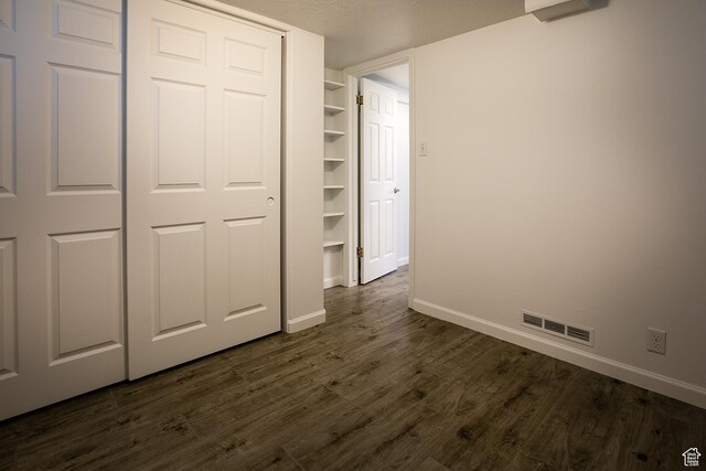 604 E 3635 S, Salt Lake City, UT 84106 - unfurnished bedroom featuring dark wood-type flooring and baseboards
