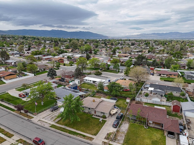 aerial perspective of suburban area featuring a mountain backdrop