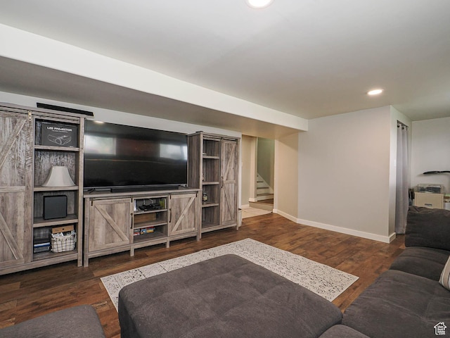 living area with stairs, dark wood-style flooring, baseboards, and recessed lighting