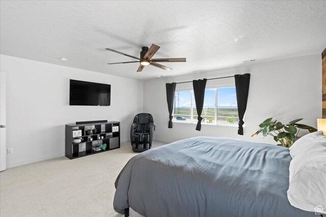 2102 S 2200 W, Woods Cross, UT 84087 - carpeted bedroom featuring a ceiling fan, baseboards, and a textured ceiling