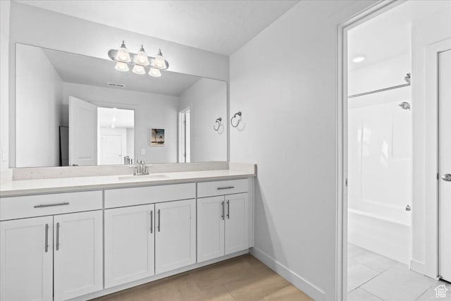 2102 S 2200 W, Woods Cross, UT 84087 - full bathroom with vanity, baseboards, tile patterned floors, and  shower combination