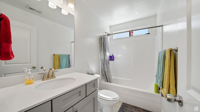 bathroom with toilet, vanity, tile patterned flooring, and shower / bath combination with curtain