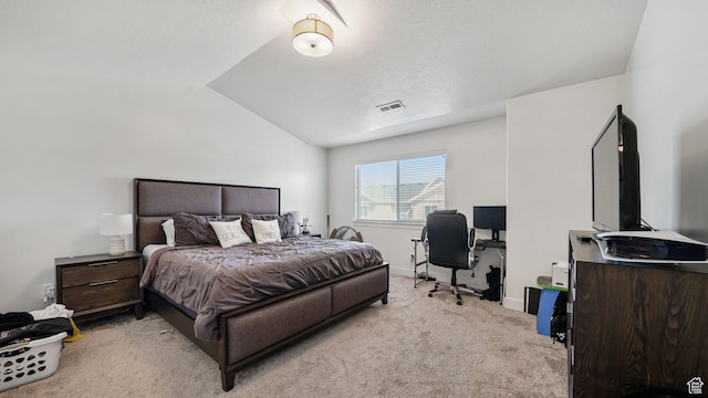 bedroom featuring carpet, lofted ceiling, an office area, and baseboards
