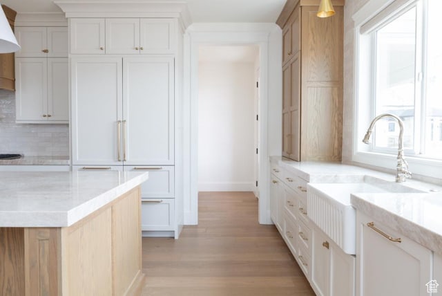 405 W 1200 N Unit 4, Mapleton, UT 84664 - kitchen featuring a sink, baseboards, tasteful backsplash, and healthy amount of natural light