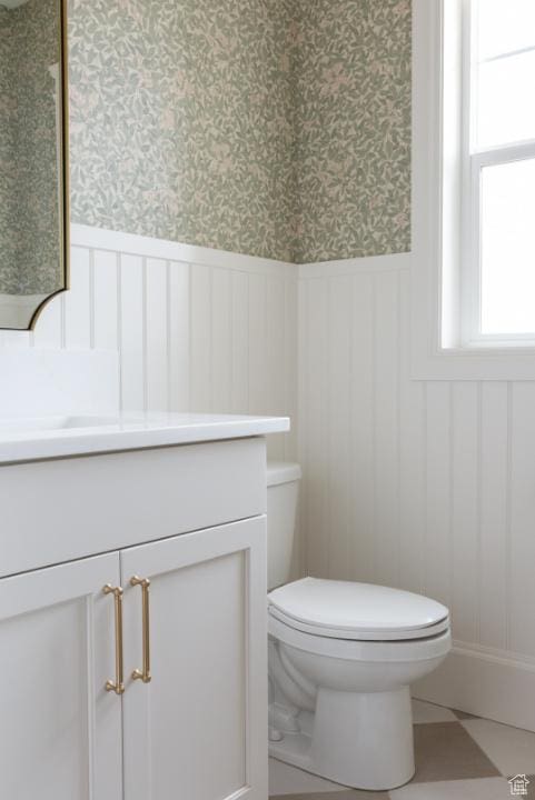 405 W 1200 N Unit 4, Mapleton, UT 84664 - bathroom with a wainscoted wall, vanity, toilet, and wallpapered walls