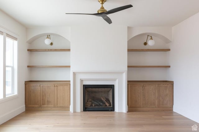 405 W 1200 N Unit 4, Mapleton, UT 84664 - unfurnished living room featuring a ceiling fan, light wood-style floors, and a fireplace