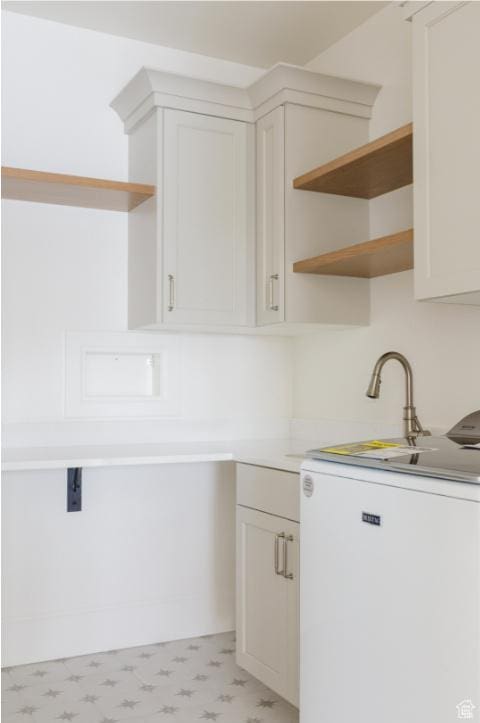405 W 1200 N Unit 4, Mapleton, UT 84664 - clothes washing area with light floors and cabinet space