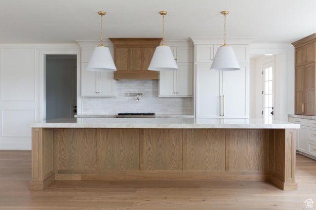 405 W 1200 N Unit 4, Mapleton, UT 84664 - kitchen featuring light wood-style flooring, backsplash, and pendant lighting