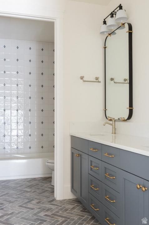 405 W 1200 N Unit 4, Mapleton, UT 84664 - full bath with toilet, vanity, washtub / shower combination, and brick patterned floors