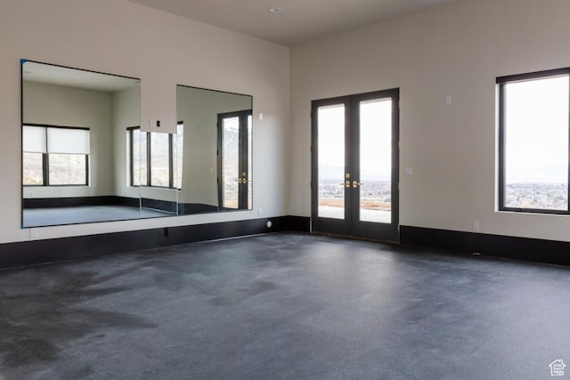443 W 1200 N Unit 3, Mapleton, UT 84664 - empty room with french doors and concrete flooring