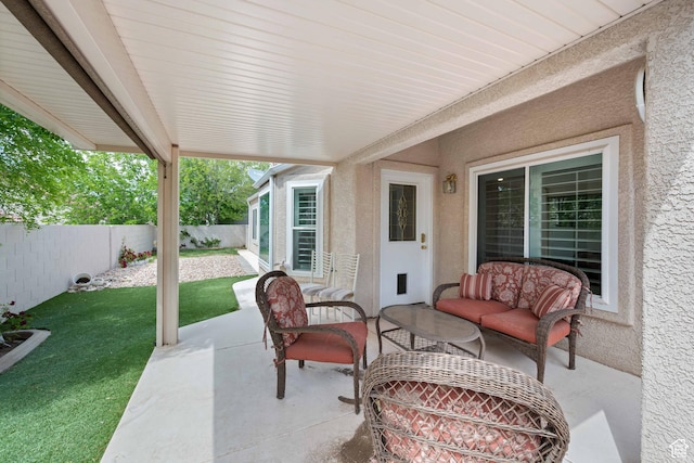 view of patio / terrace with a fenced backyard and outdoor lounge area