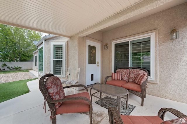 view of patio / terrace with fence