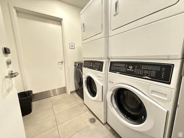 2670 Canyons Resort Dr Unit 129, Park City, UT 84098 - laundry room with washer and dryer, light tile patterned flooring, and baseboards
