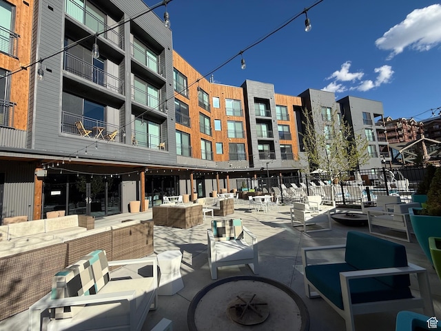 2670 Canyons Resort Dr Unit 129, Park City, UT 84098 - surrounding community with an outdoor hangout area, fence, and a patio