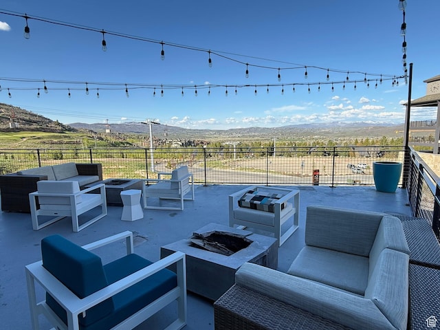 2670 Canyons Resort Dr Unit 129, Park City, UT 84098 - view of patio featuring an outdoor living space with a fire pit and a mountain view