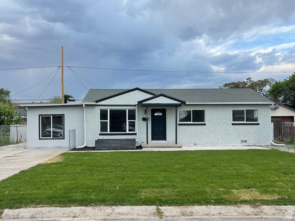 1426 W Carlos Dr S, West Valley City, UT 84119 - ranch-style house featuring brick siding
