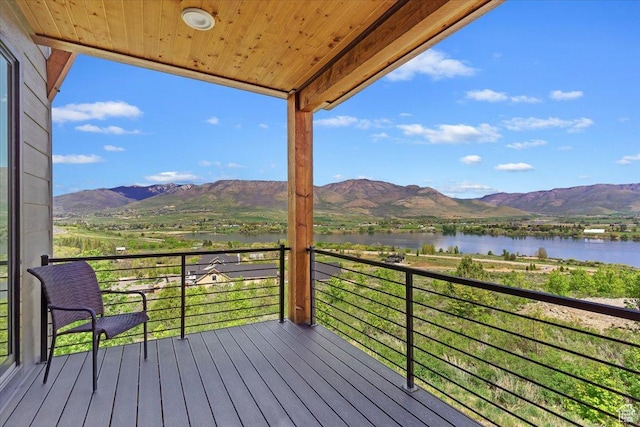 1108 N Lakeside Ct, Eden, UT 84310 - wooden deck with a water and mountain view