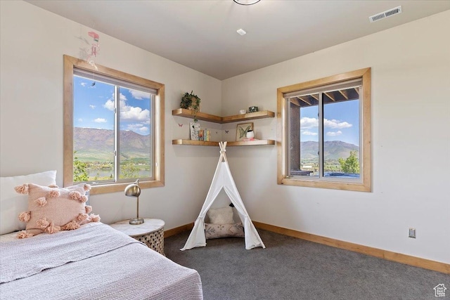 1108 N Lakeside Ct, Eden, UT 84310 - carpeted bedroom featuring baseboards and a mountain view