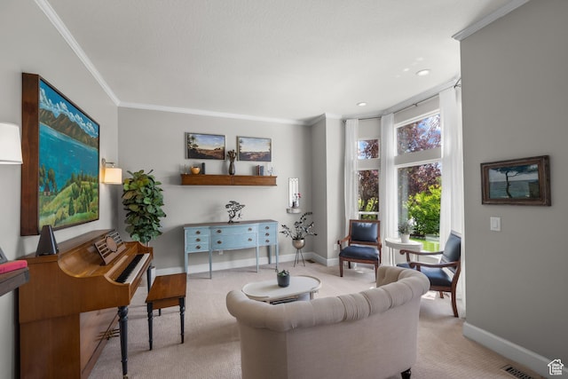 living area with ornamental molding, baseboards, and carpet floors