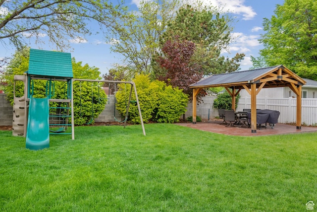 view of jungle gym with a gazebo and a patio area