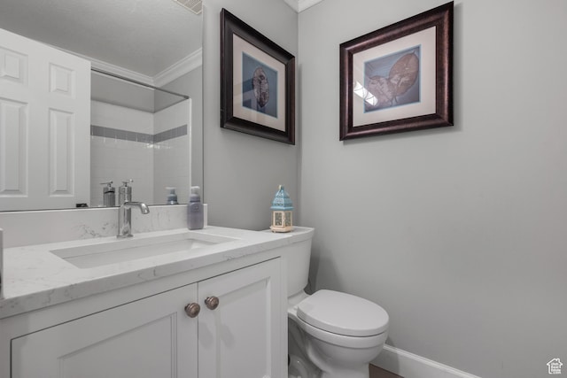 full bath featuring crown molding, toilet, a shower, vanity, and baseboards