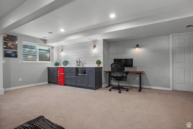 home office with light carpet, baseboards, recessed lighting, and bar