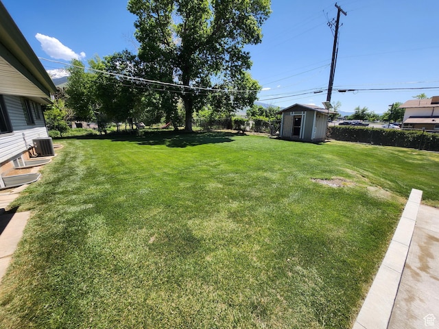 628 E 150 S, Kaysville, UT 84037 - view of yard with a storage unit, an outdoor structure, and central AC