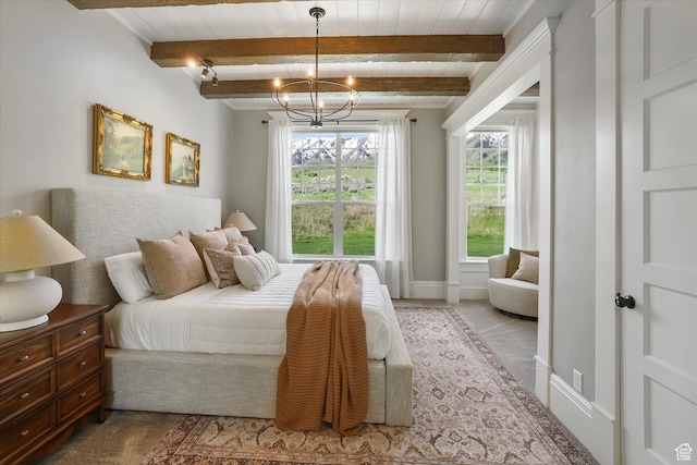 6071 W 1800 S, Mendon, UT 84325 - carpeted bedroom featuring beam ceiling, a chandelier, and baseboards
