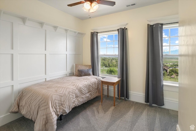 6071 W 1800 S, Mendon, UT 84325 - bedroom with multiple windows, carpet flooring, and ceiling fan