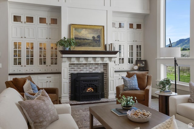 6071 W 1800 S, Mendon, UT 84325 - living room with a brick fireplace and a mountain view