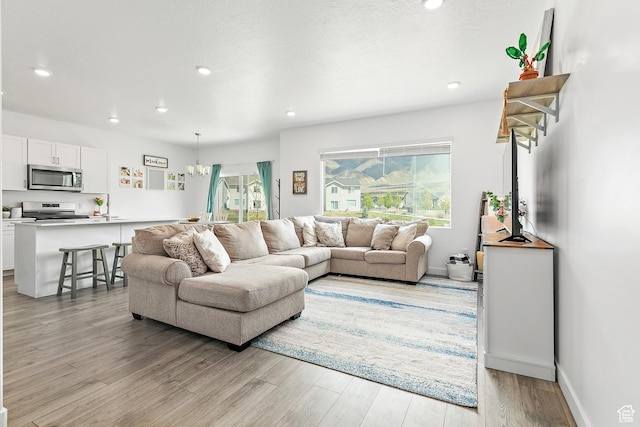 895 S Brubaker Way, Santaquin, UT 84655 - living room with light wood-type flooring and recessed lighting