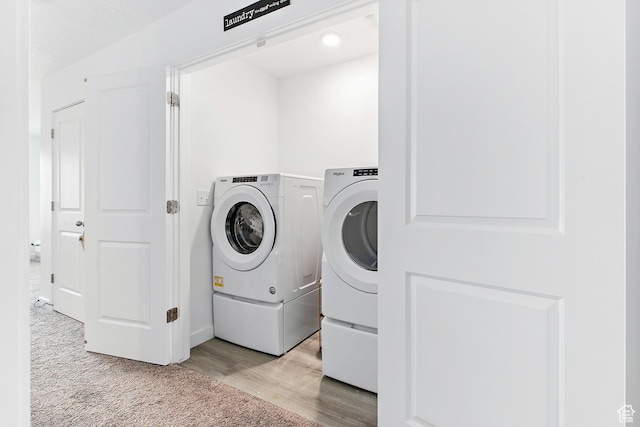895 S Brubaker Way, Santaquin, UT 84655 - clothes washing area featuring independent washer and dryer, light wood-type flooring, baseboards, and light colored carpet