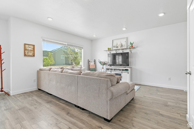895 S Brubaker Way, Santaquin, UT 84655 - living room with light wood-type flooring, baseboards, and recessed lighting